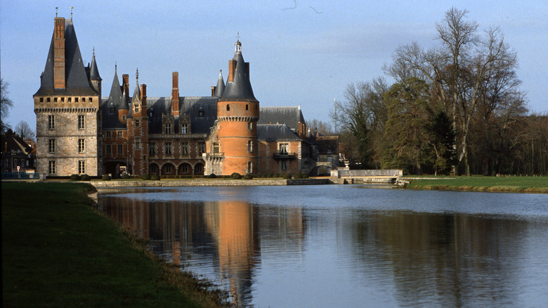 French château on the shore of a lake