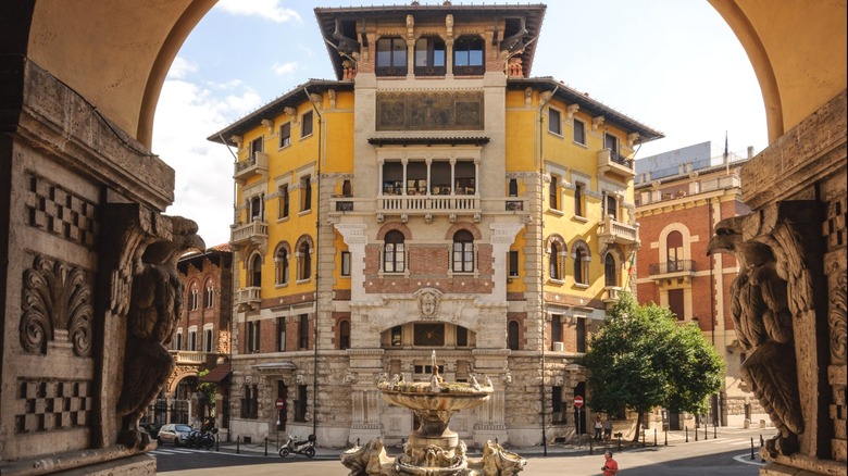 Small town square with fountain and Art Deco architecture