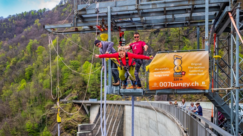 Woman jumps from GoldenEye Bungee Jump Vallmaggia