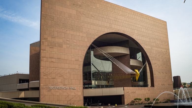 Large, brown front entrance to Segerstrom Hall