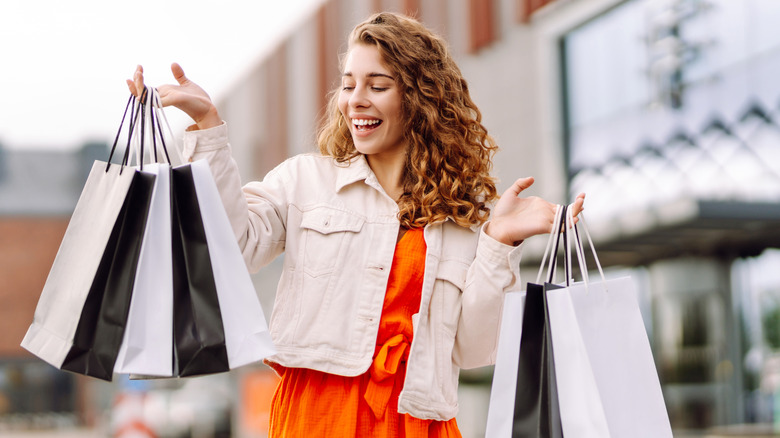 Woman carrying shopping bags