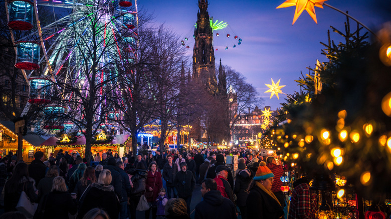 Crowded outdoor market December twilight Edinburgh, Scotland