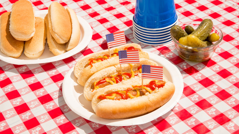 Hot dogs on a tablecloth with American flags