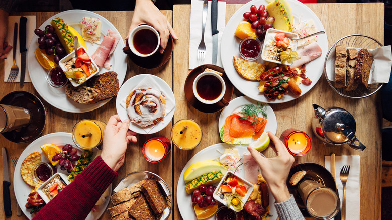 Overhead view of a hearty Scandinavian-style breakfast spread on the table