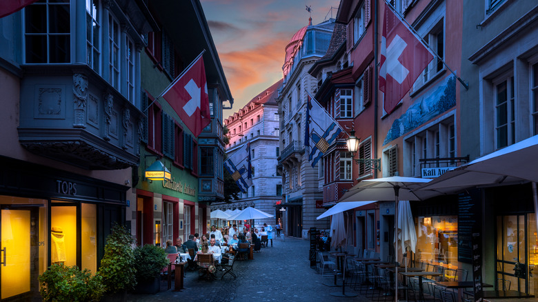 Twilight diners eating al fresco in Zurich, Switzerland