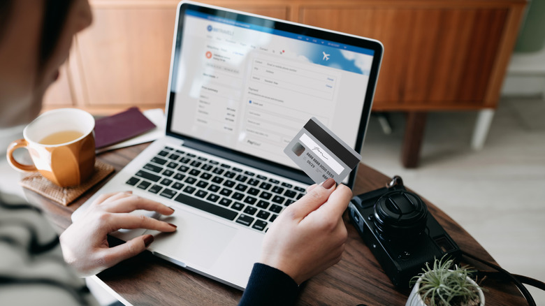 woman paying online with card