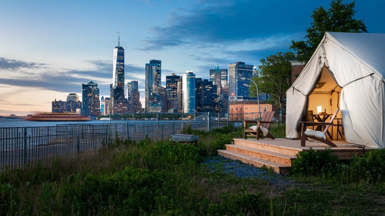 Glamping on Governors Island with the Manhattan skyline in the background