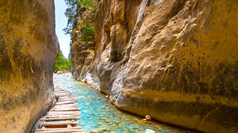 Hike between cliff faces in Crete