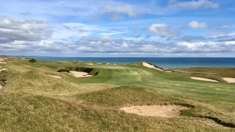 View of Whistling Straits golf greens with lake in distance