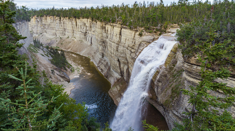 Vaureal Waterfall cascading from the forest on Anticosti Island