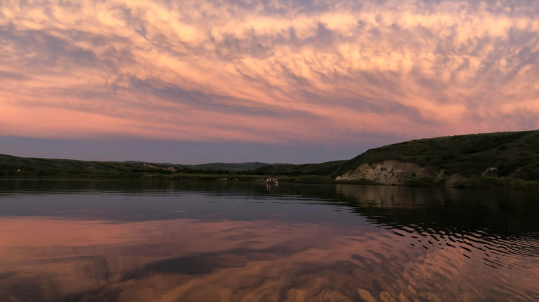 A sunset at the Bear Paw Mountains in Beaver Creek Park.