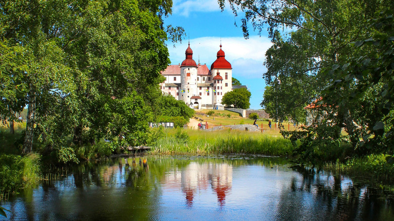 Läckö Castle reflected on the water in West Sweden