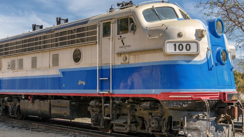 A vintage blue and white train