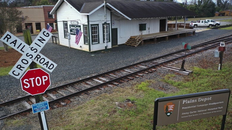 Train tracks and railroad crossing sign outside Plains Depot Jimmy Carter campaign headquarters