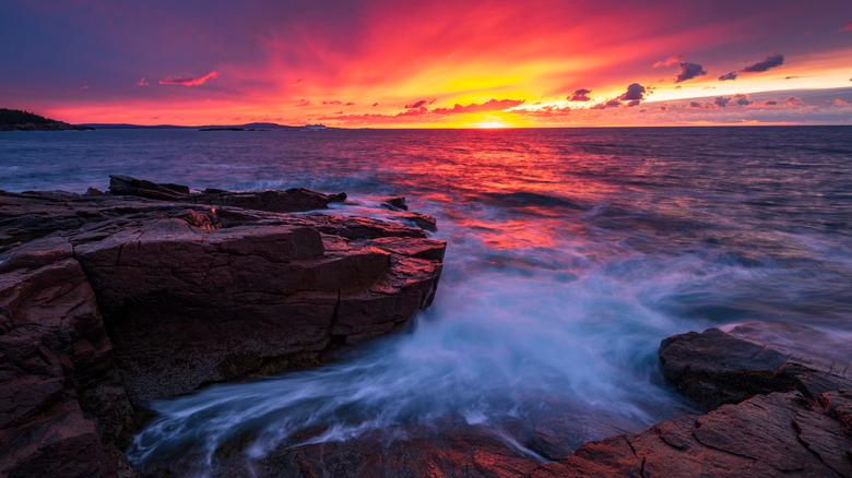 sunset over acadia rocky shore