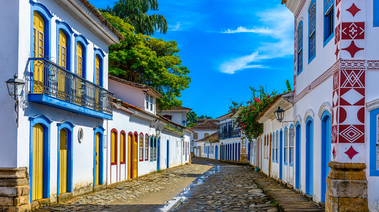 View of a cobblestone street and historic buildings in Paraty