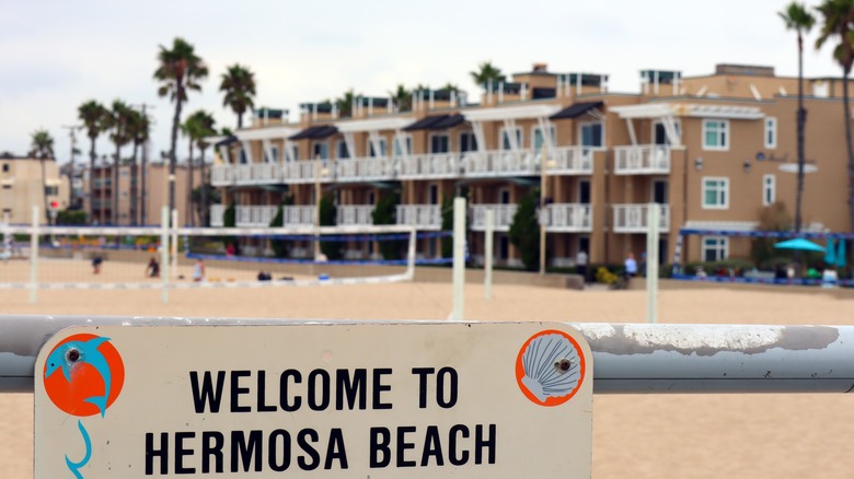 Sign in Hermosa Beach with the Beach House in the background