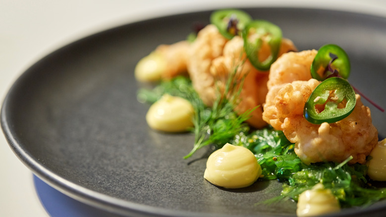 Elegant plate of salmon and greens