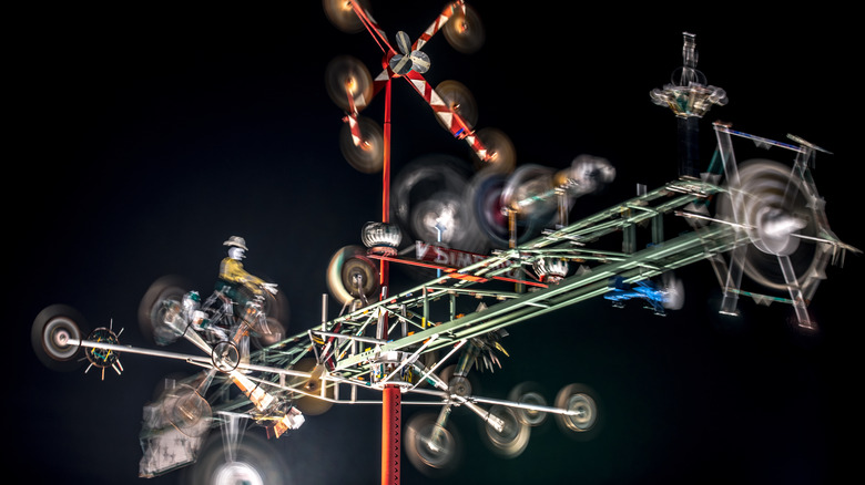 A Vollis Simpson whirligig at night