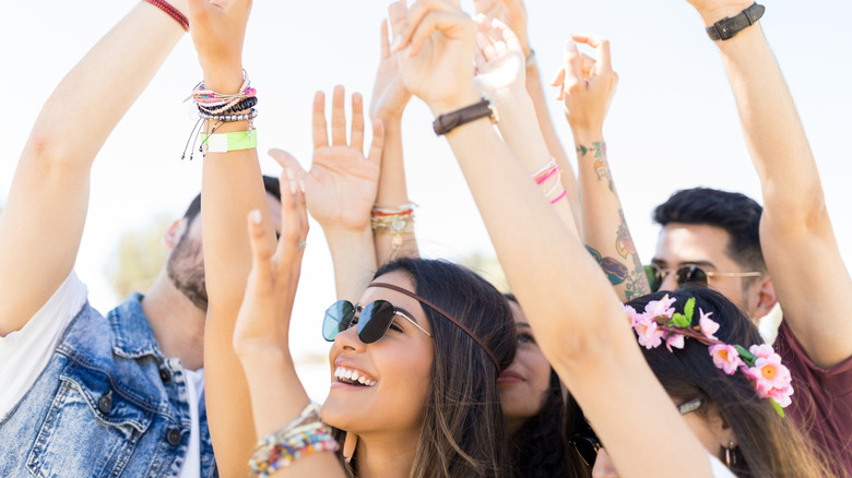 Group of people dancing at a festival