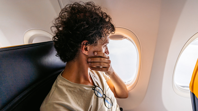 nervous man on plane