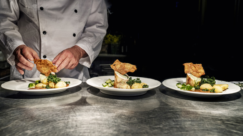 A chef preparing food at a restaurant