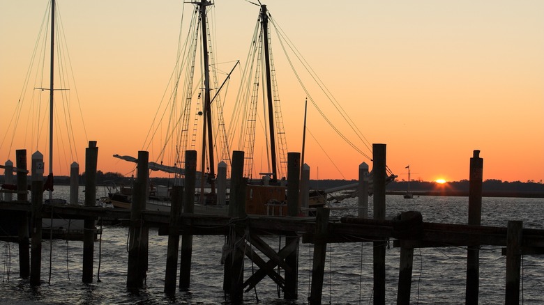 Sunset at marina with boats