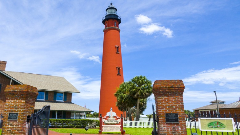 The Ponce de Leon Inlet Lighthouse standing on the ground of the museum