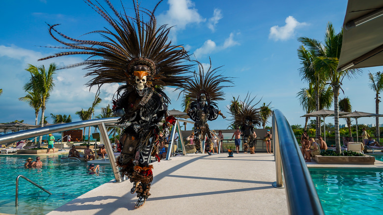 Local folklore dancers perform at the Atelier Playa Mujeres Hotel