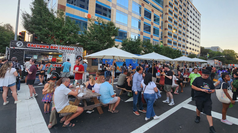 People trying out foods at Sacramento's Farm-to-Fork Festival