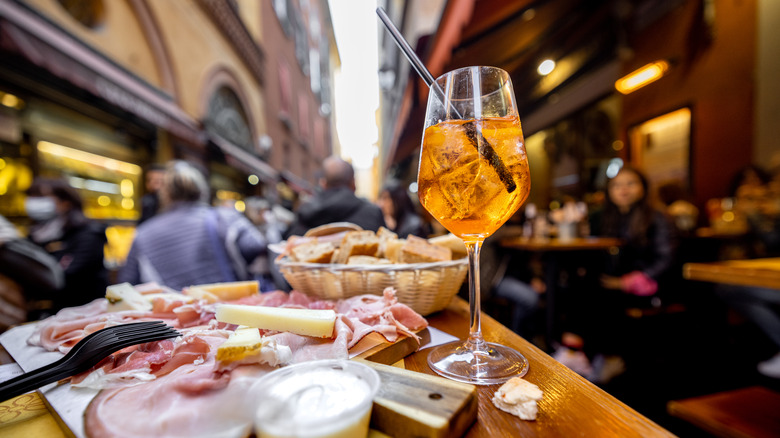 Charcuterie board and Aperol Spritz