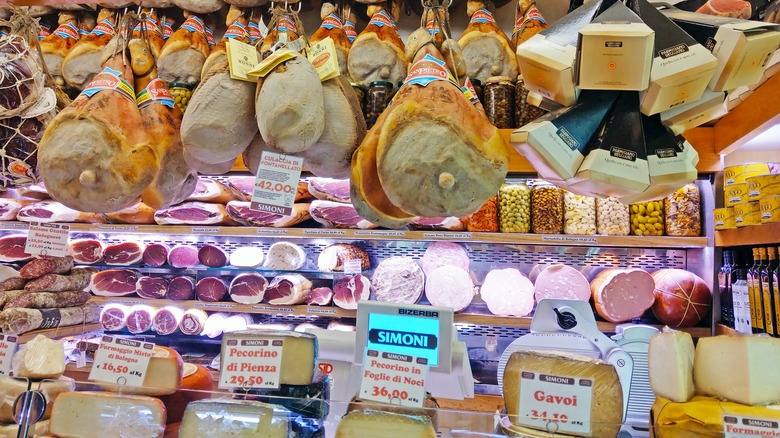 Deli case with meats and cheeses.