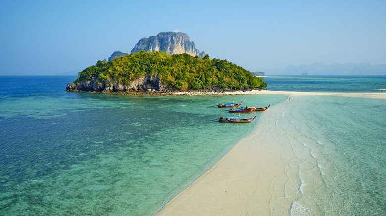 Boats on a sand bank in Krabi 