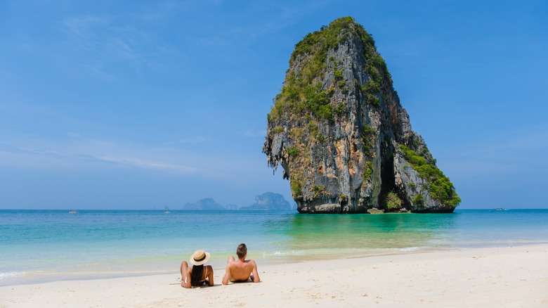 Couple on Railay beach in Krabi, Thailand