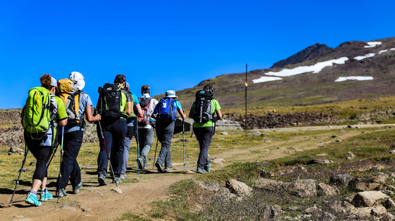 A group of hikers explore mountains in Armenia