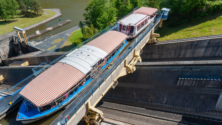 Barge on boat lift being raised up the slope