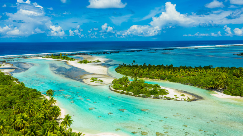 Aerial view of Rangiroa with clear blue waters