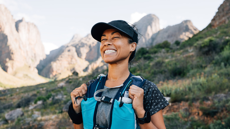 A hiker smiling