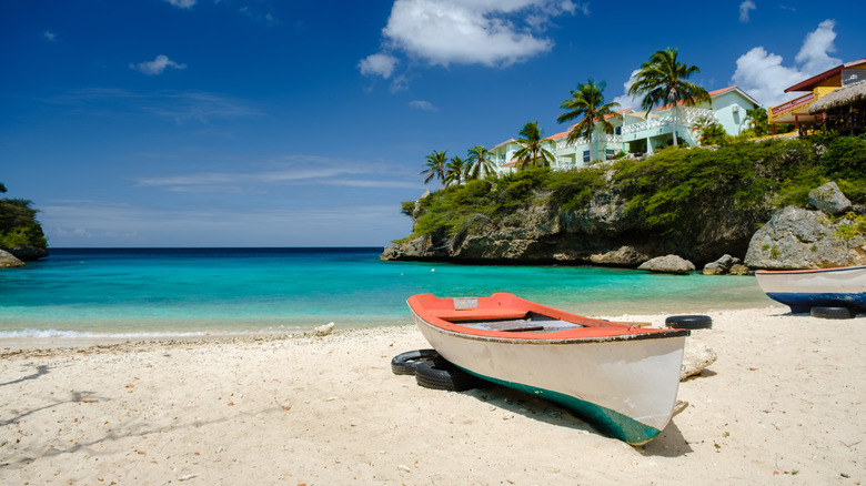 Tropical beach with boat