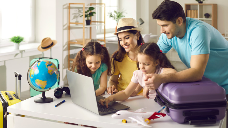 Family researching on computer