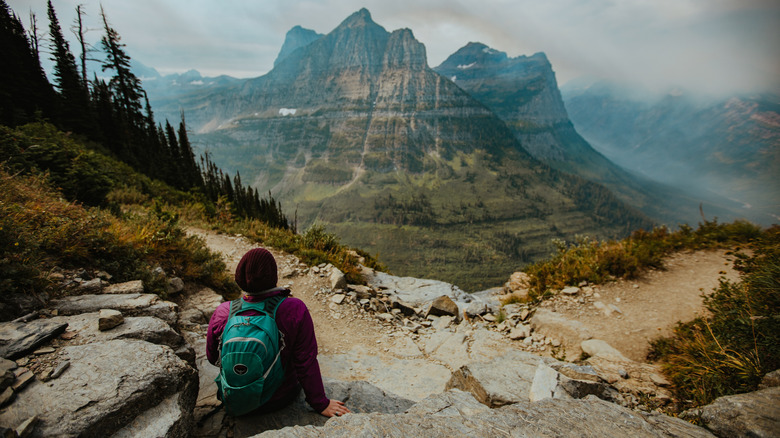 A person resting on Highline Trail