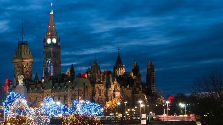 The Fairmont Château Laurier hotel in Ottawa, lit up at night for the winter holidays