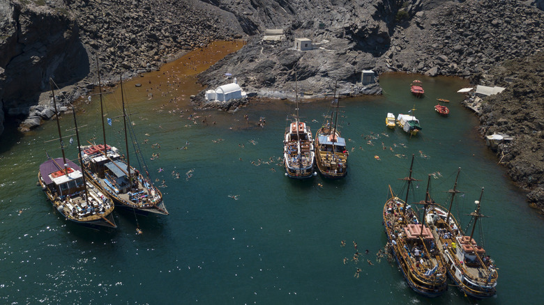 Boats at Santorini's hot springs