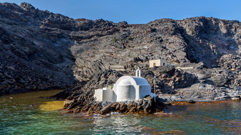 Hot springs and chapel in Santorini