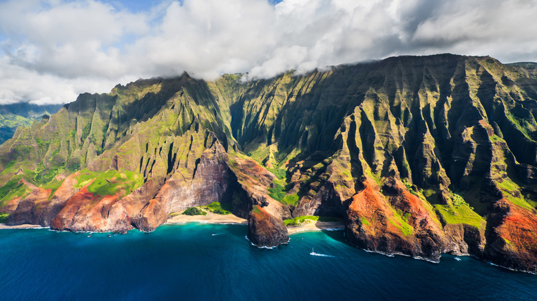 Na Pali coast with mountains, clouds and water