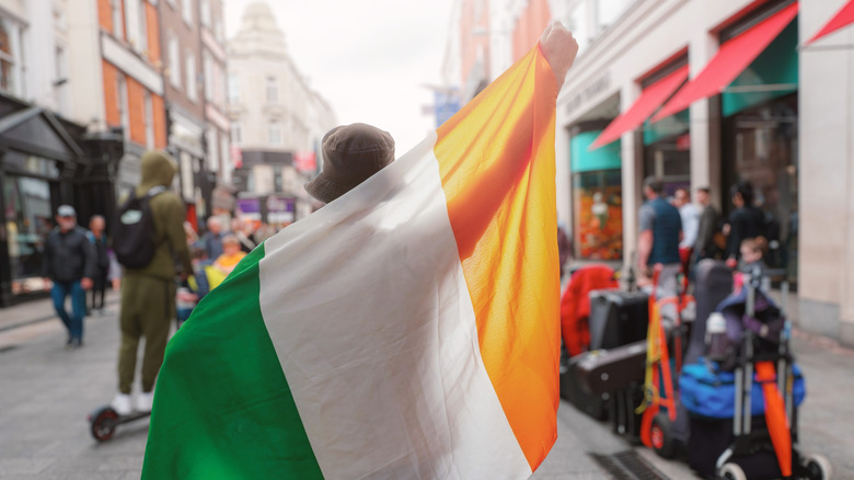 Someone waving an Irish flag