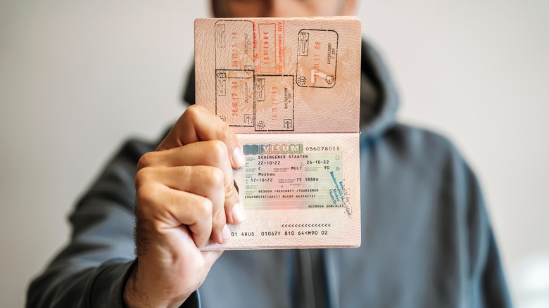 Person showing off their passport