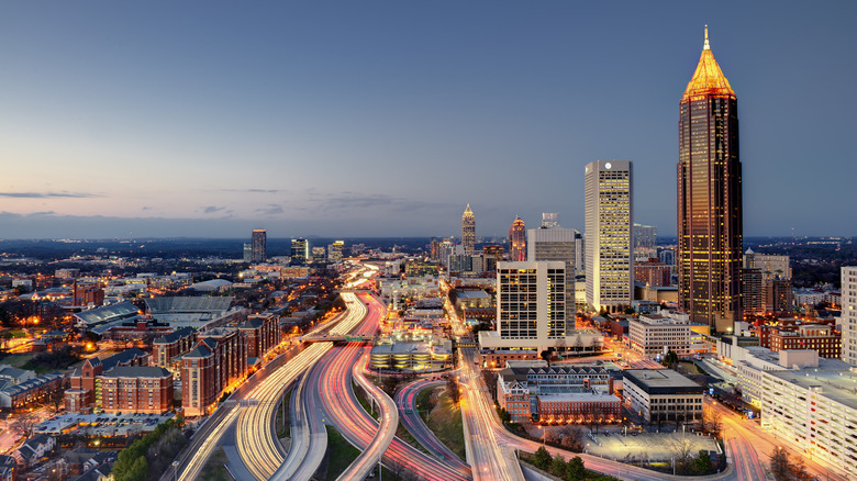 The Atlanta skyline lit up at dusk