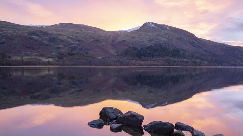 Mountain at sunset reflected on the lake