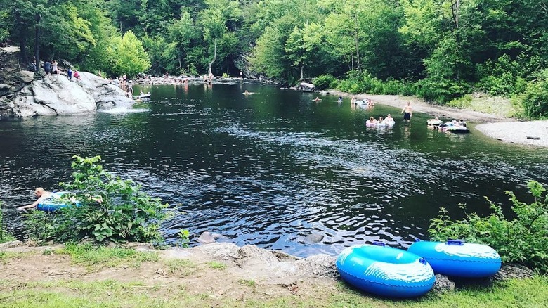 People enjoying the water at the Townsend Wye in the Great Smoky Mountains National Park